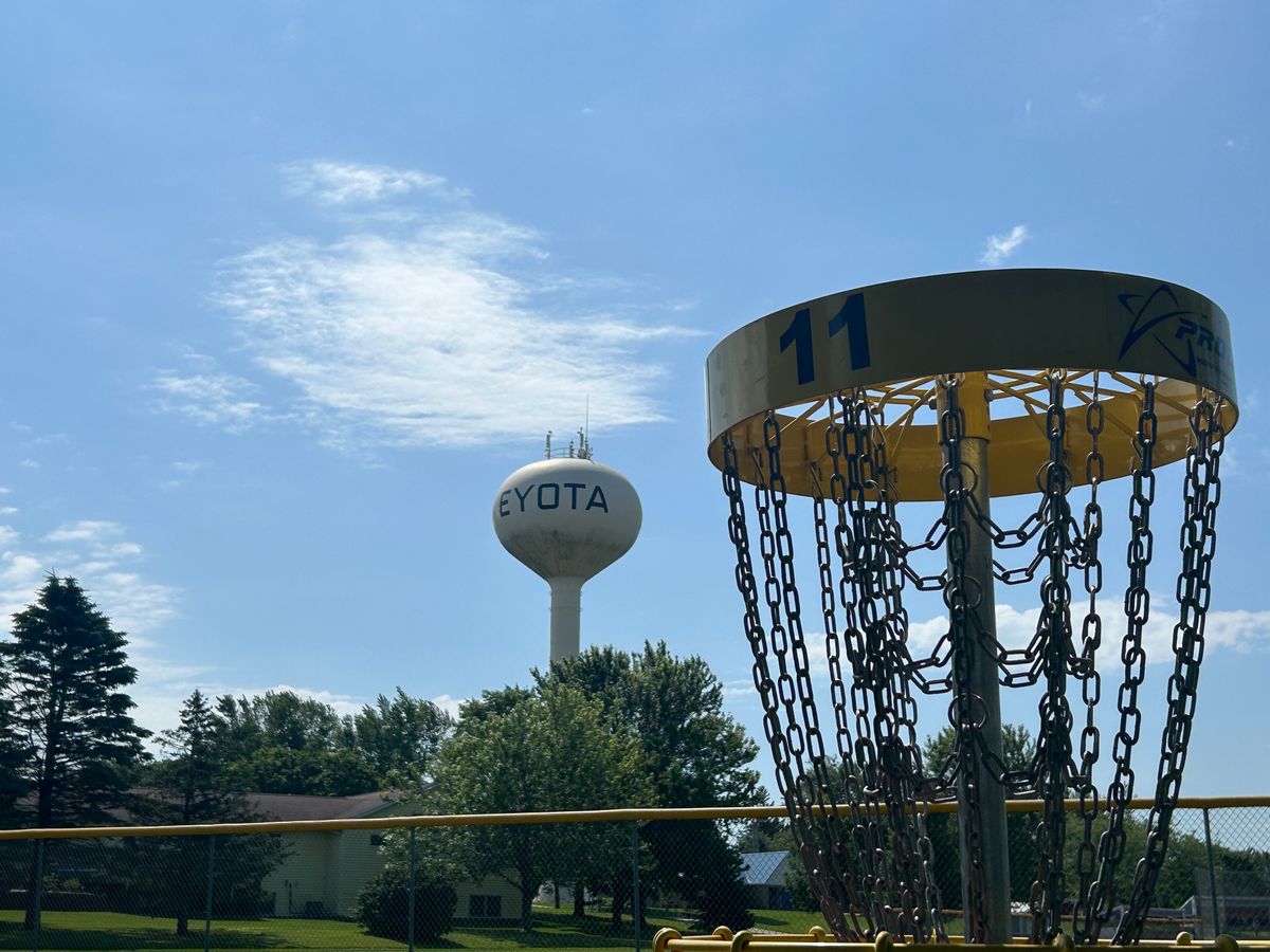 Hole 11 basket with water tower behind