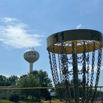 Hole 11 basket with water tower behind