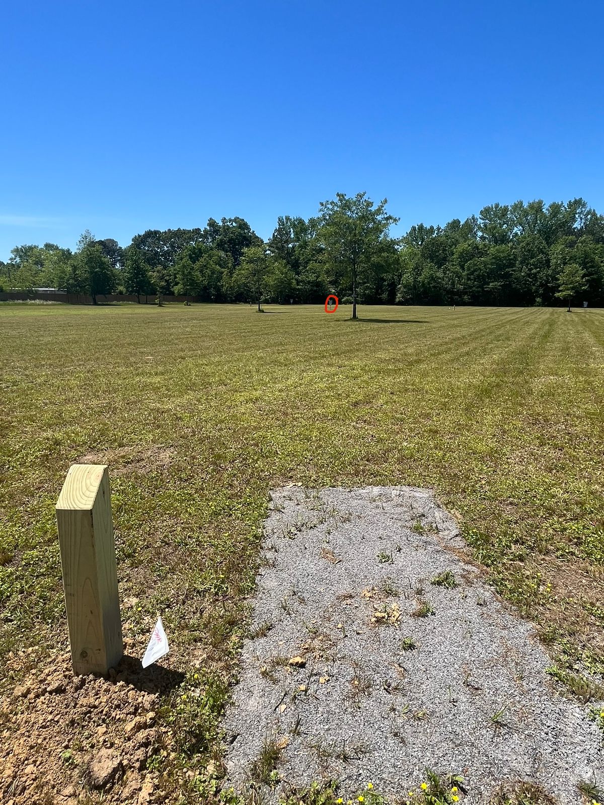 250’ Marked Mando to Left of first tree for player safety