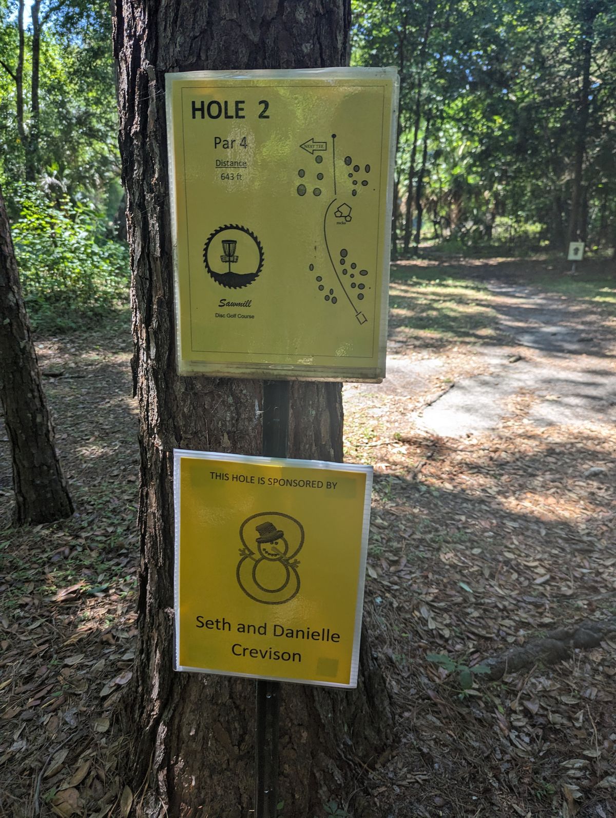 Hole 2 tee and sponsor sign