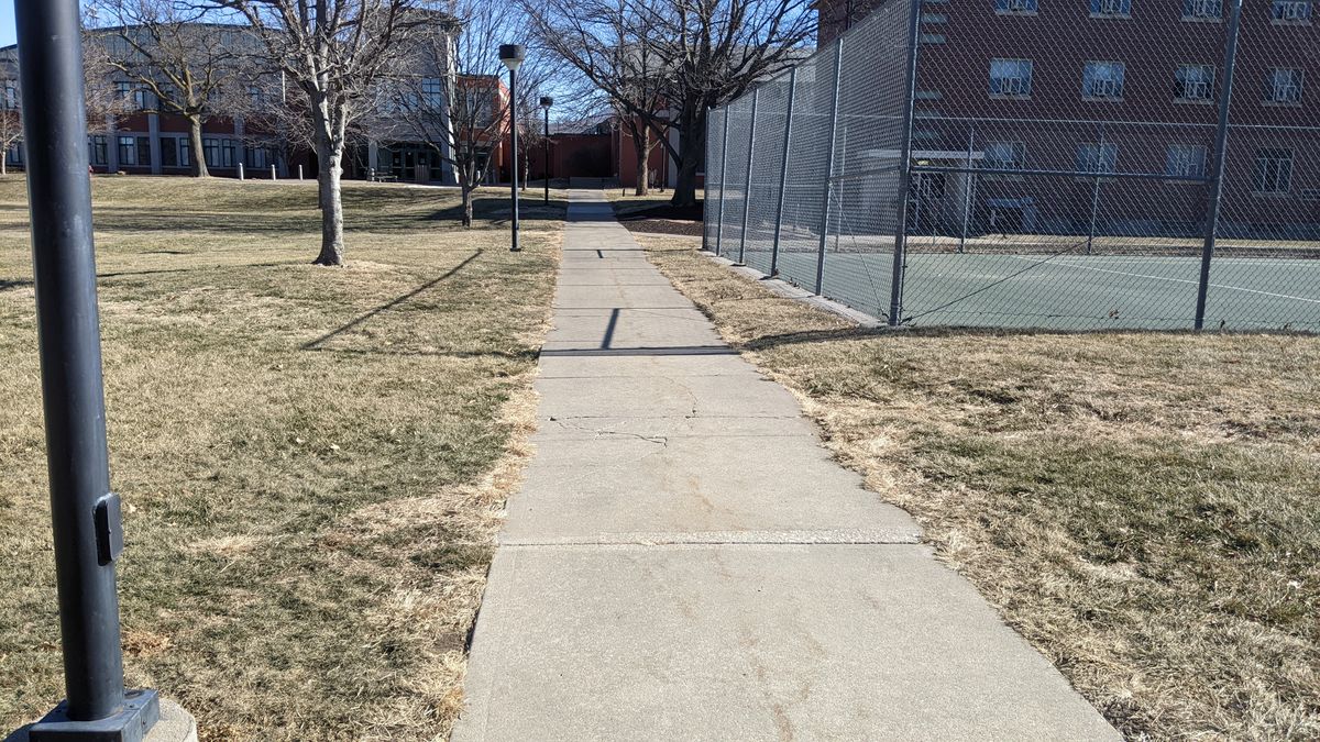 Tee #2 basket at end of sidewalk