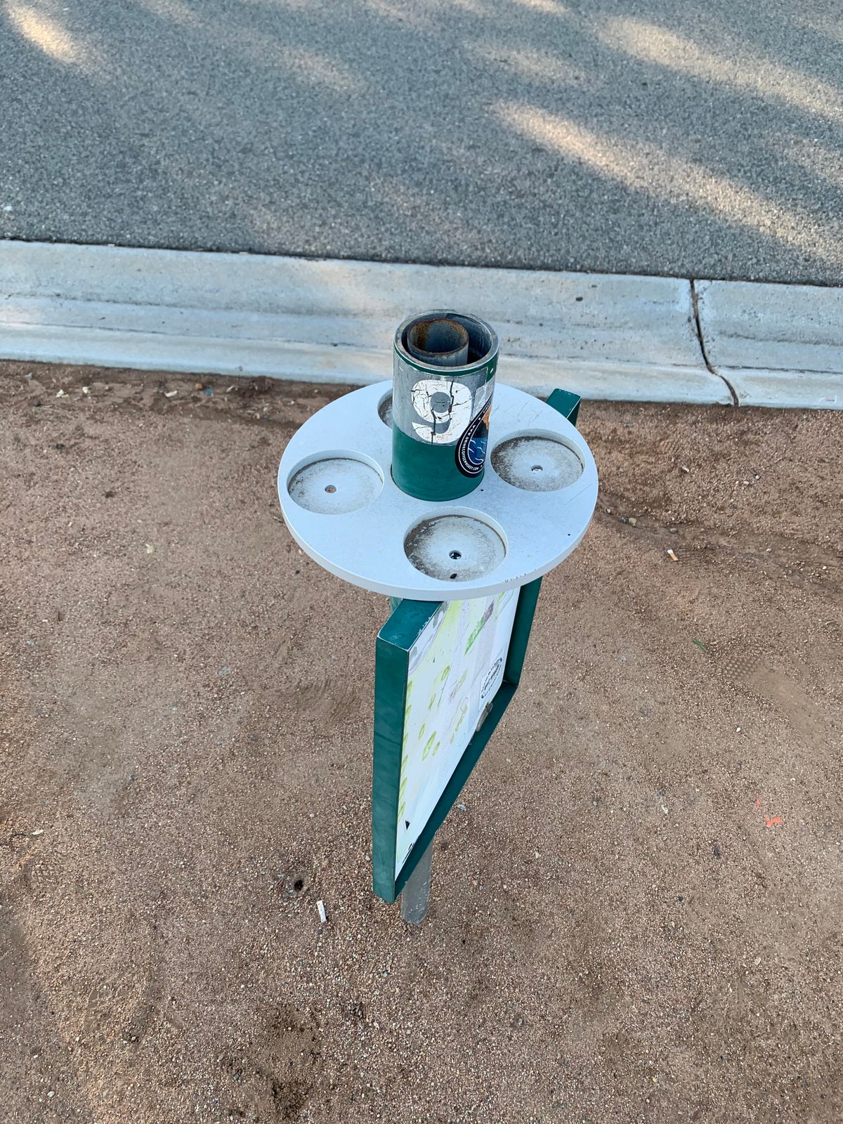 “Soda” holders on each tee sign! Nice feature