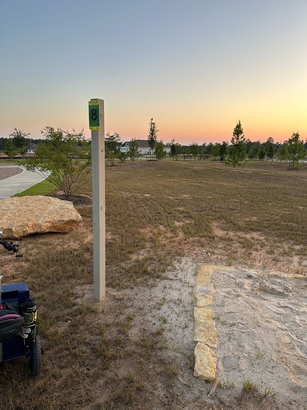 Hole 8 steeped and sign