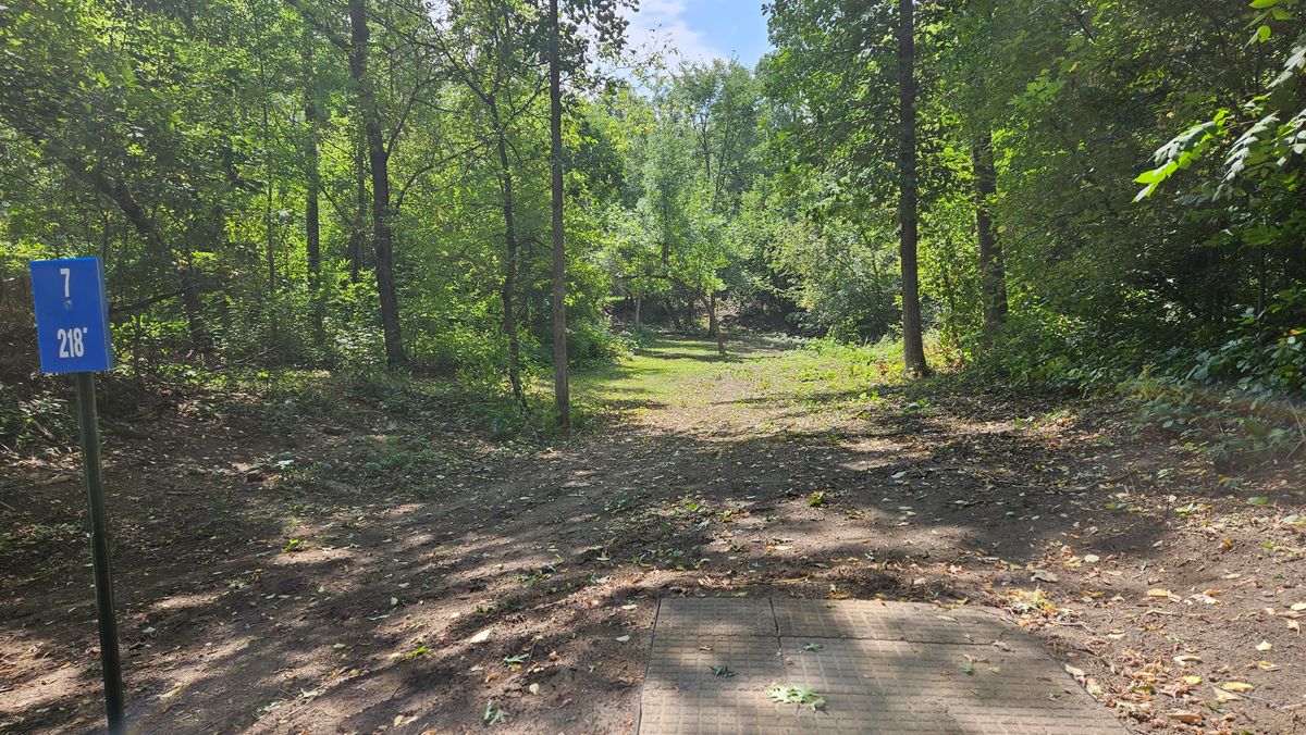Hole 7. Can you shoot it under the arched tree and set yourself up for a birdie?