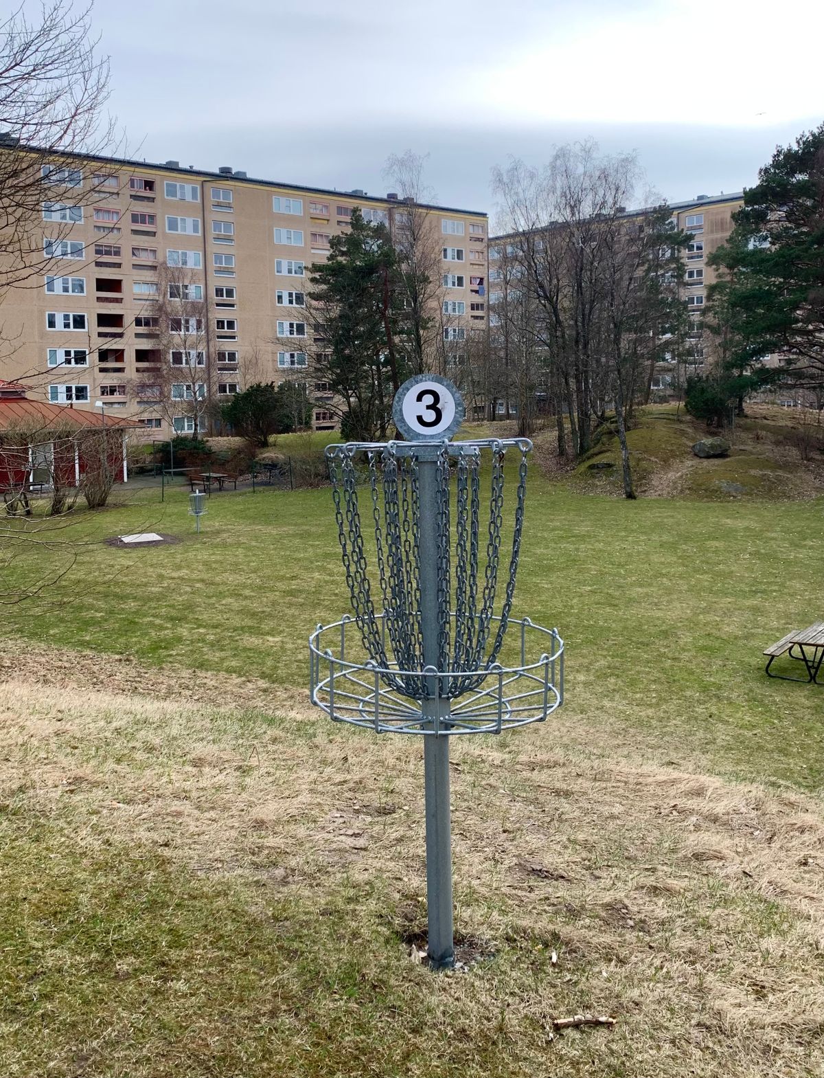 Hole 3, 30 m uphill shot and a sloped green
