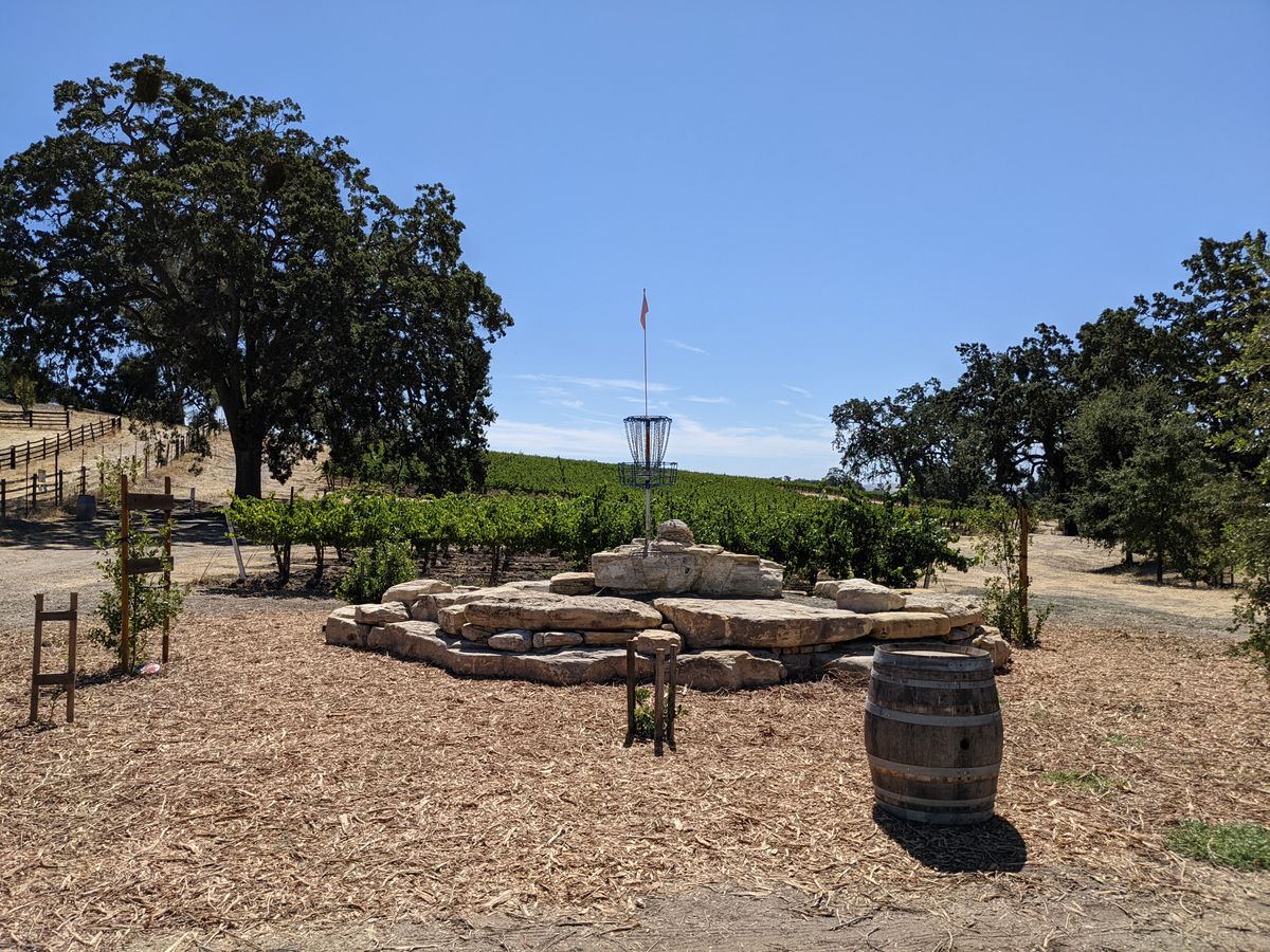 World famous pyramid built from stone from other vineyard locations. Played from either 4 or 6 teepads, depending on course layout at the time. 