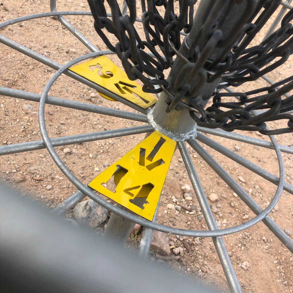 Follow the arrow to tee pad 2 or 14