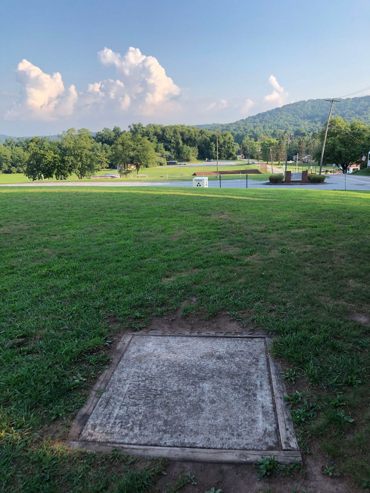 Island hole with layup to road or 225 ft. of power downhill.