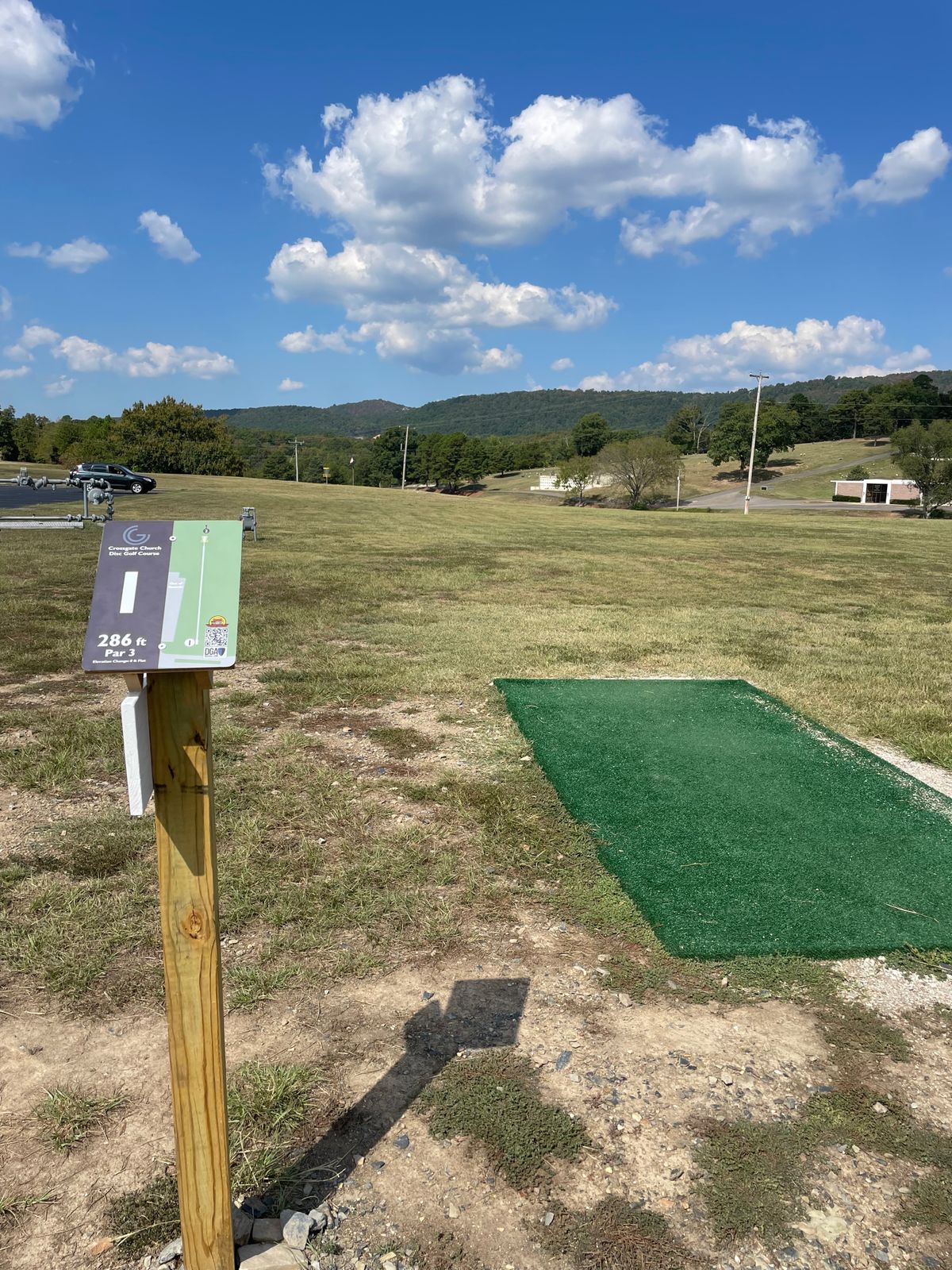 Hole 1. Steep drop past basket.