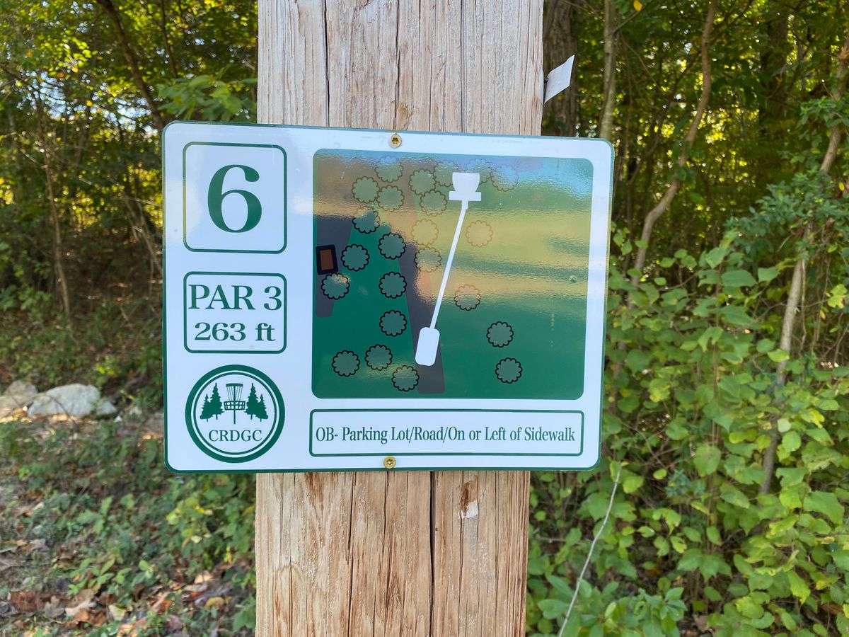 Hole 6 sign (white)