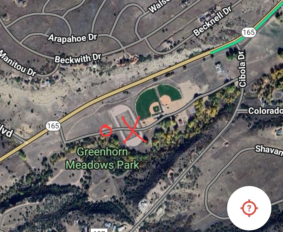 Road does not go through, park at circle.