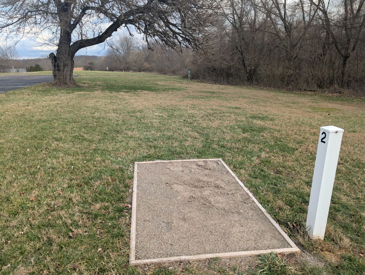 Sandy tee pad built far smaller than standard.