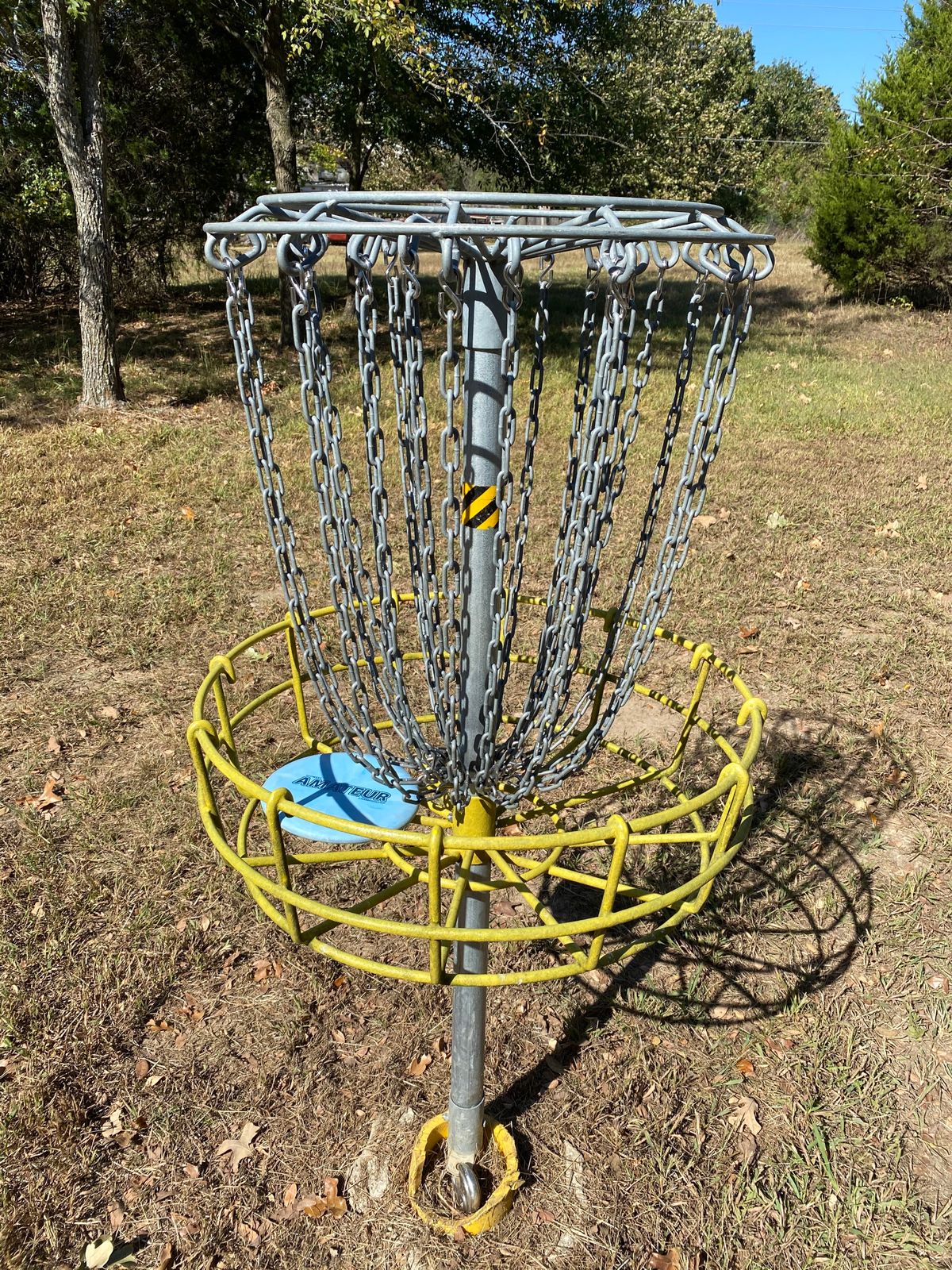 Helpful tape on pole of baskets to aim for