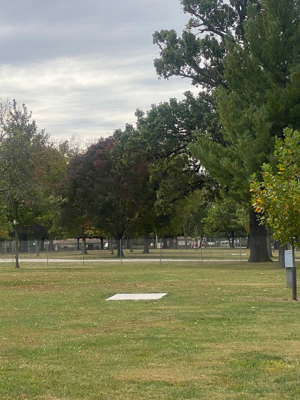 Fairway 2 has a new fenced in area from the road to the Chautauqua. No access point to get discs out