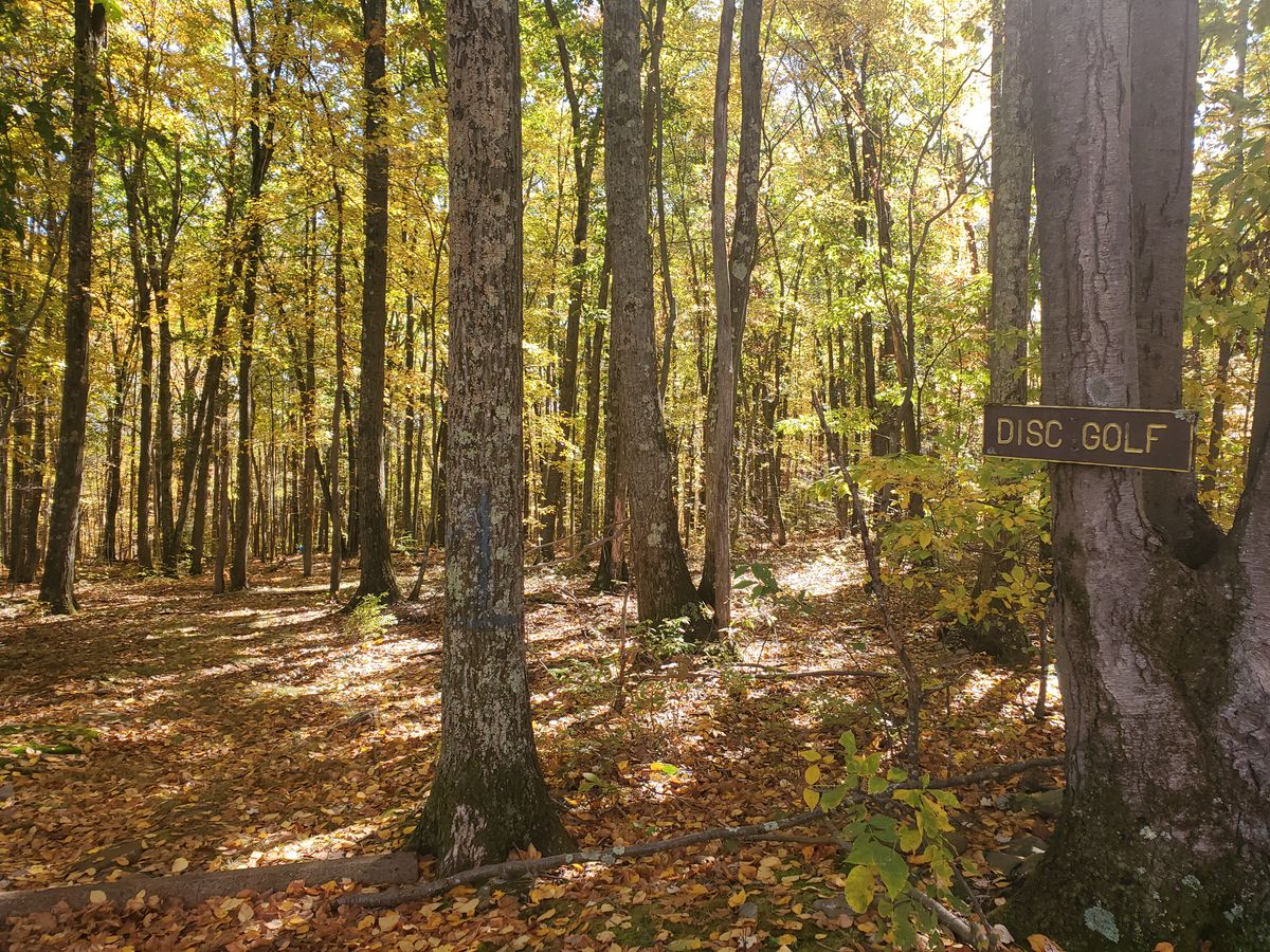 Near first hole. Entry to the course marked by sign