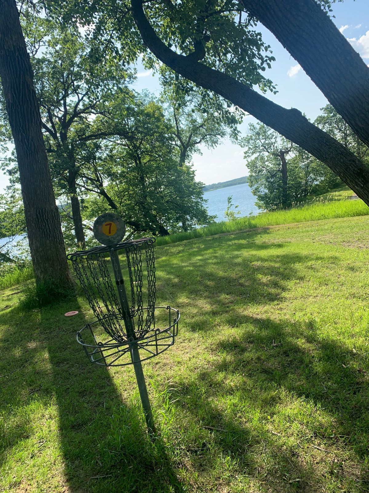 View of hole 7. Lake in the background. Cool hole.