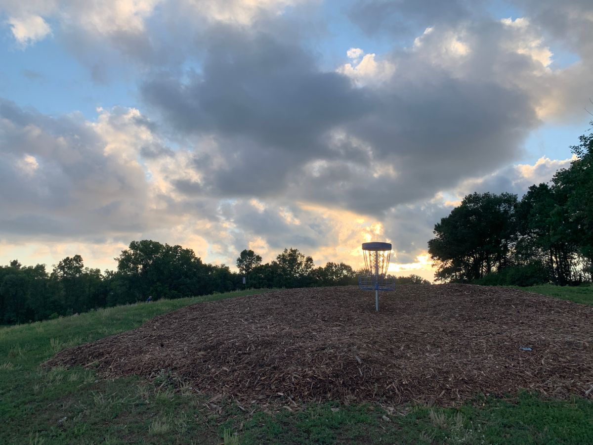 Hole 9 basket with nice sunset