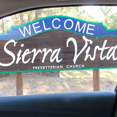 Tee-box 1 is right behind this sign that welcomes you when you turn into the parking lot.