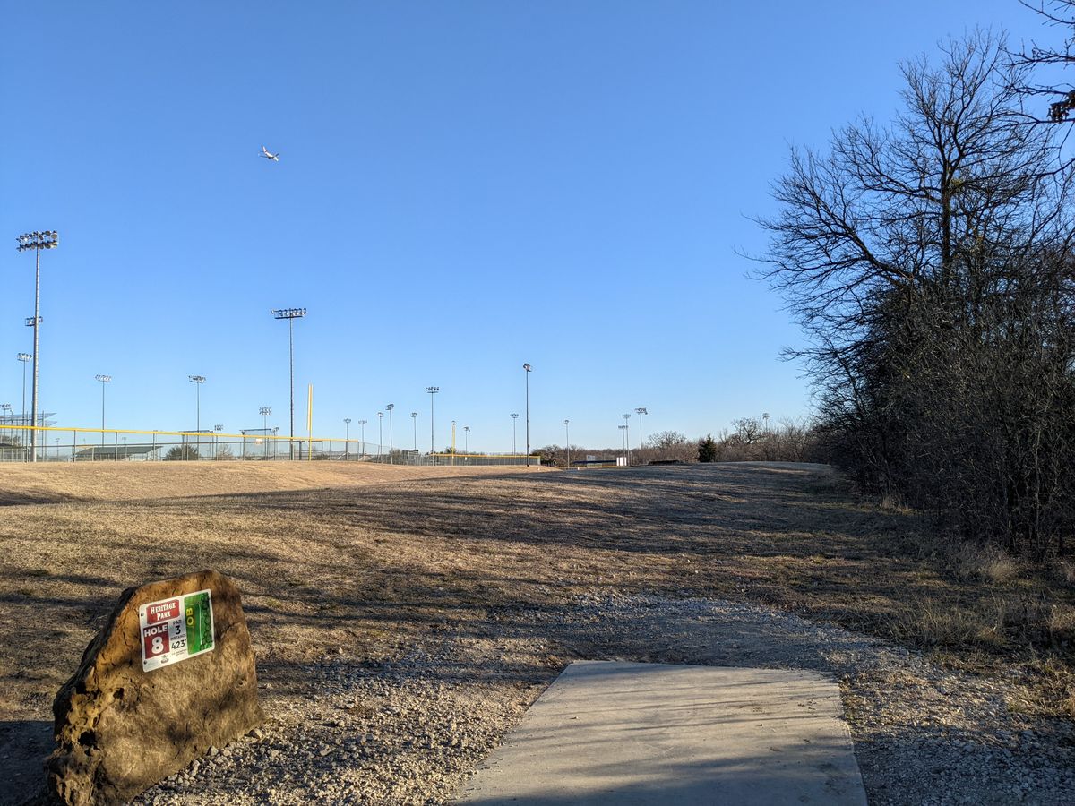 Hole 8 - basket is long, on the left side of the ravine.