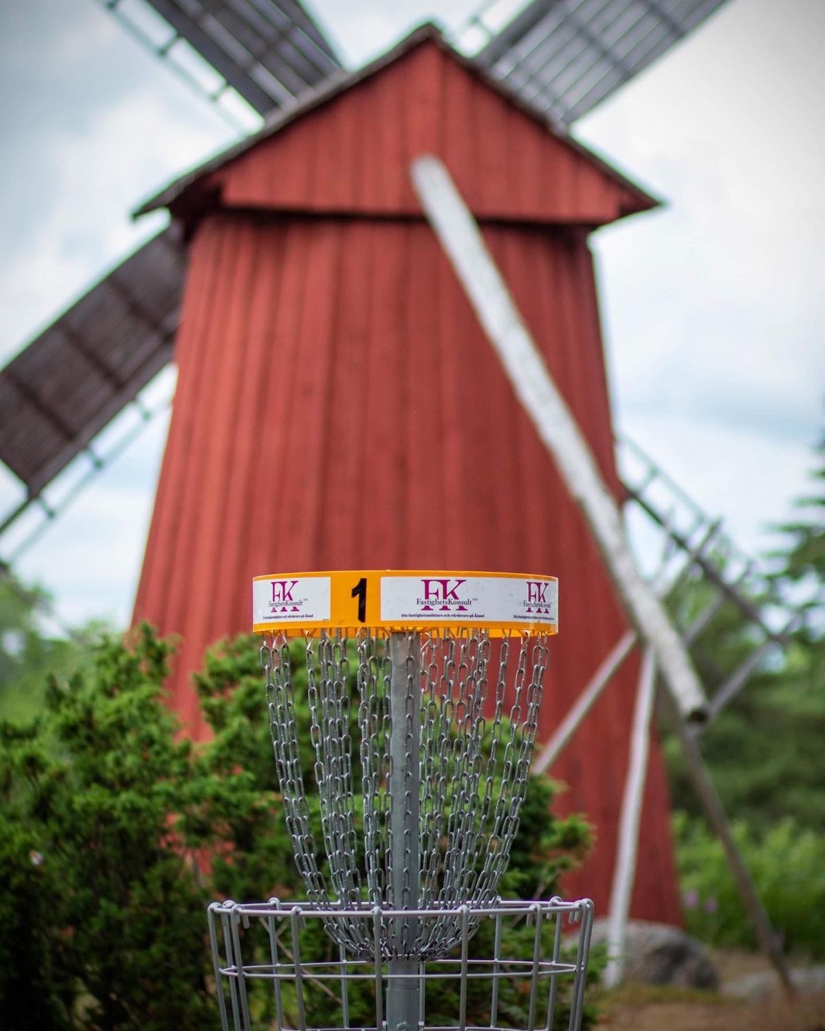 Basket on hole 1 with windmill in the background