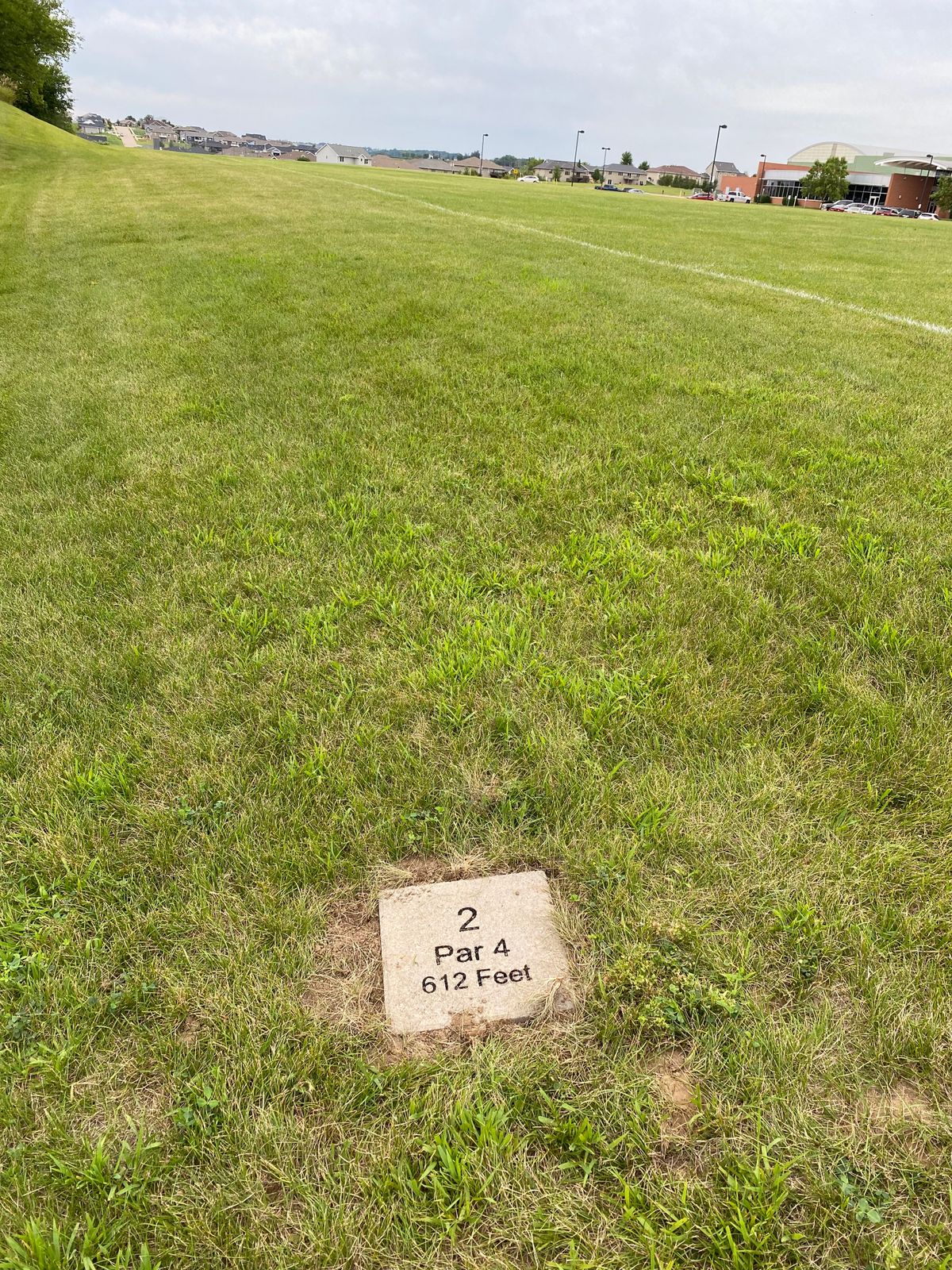 Hole 2 tee pad. Throw over the football field.