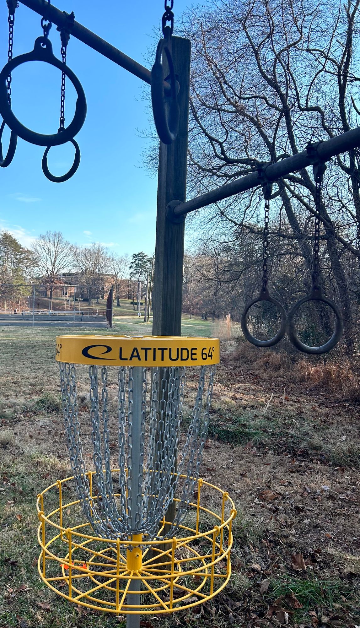 Hole 6s unique basket location surrounded by outdoor gym equipment