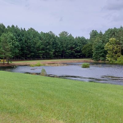 Work is done on hole 1's pond and the water back up.