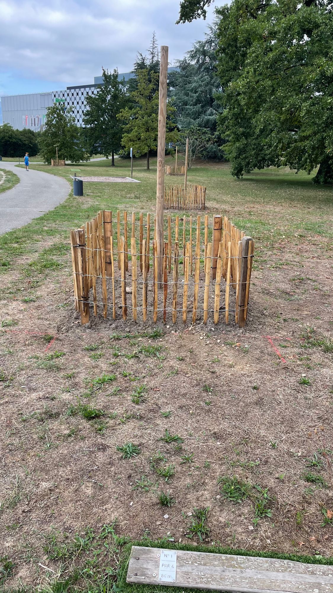 First hole, lots of new obstacles! Basket in trees in-line with these poles.