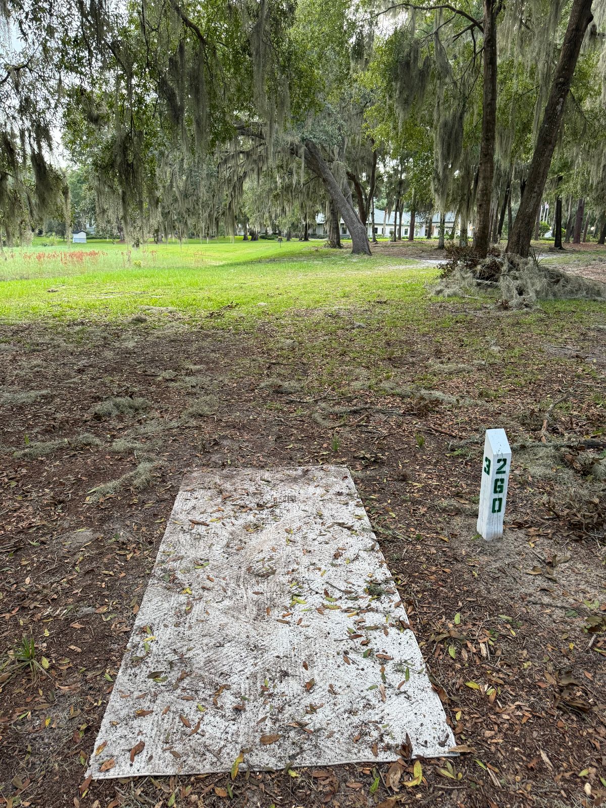 Surrounded by water is OB.  Mando to the left of the third tree past the picnic table on the right hand side of the fairway.  