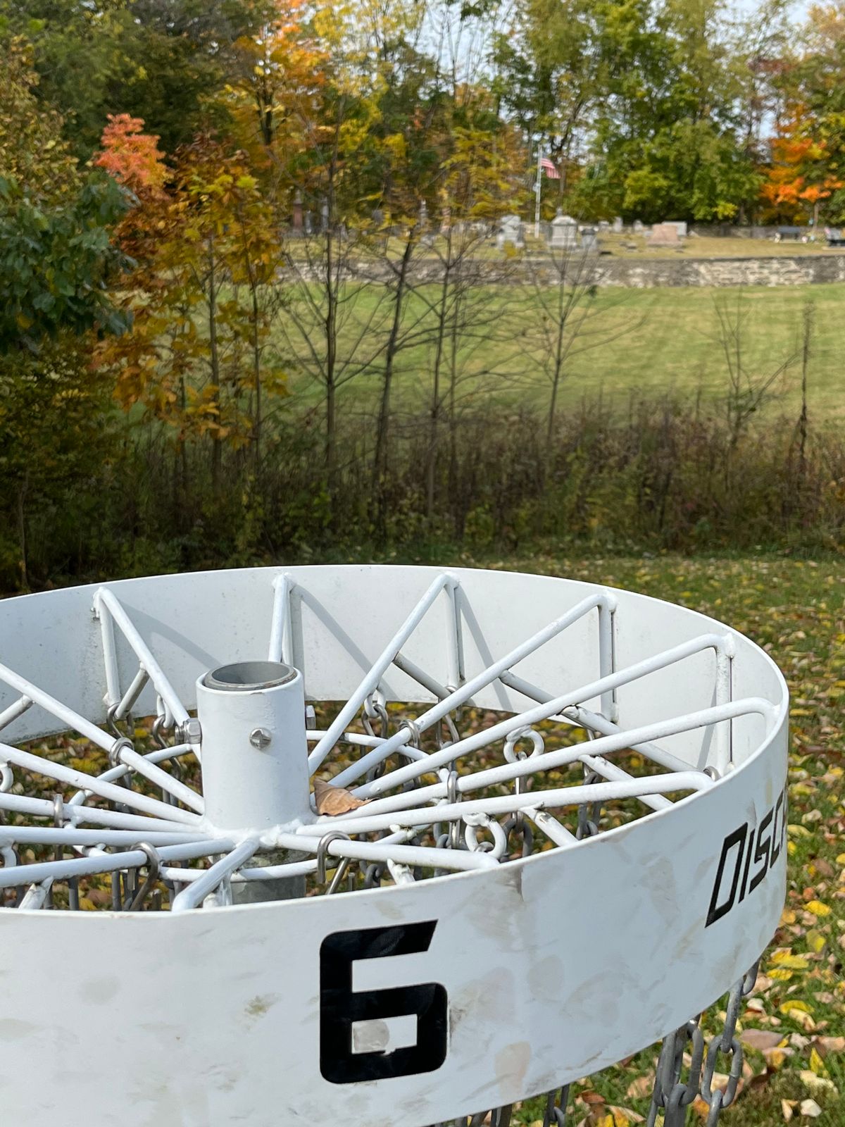 Basket on 6 cemetery in background.