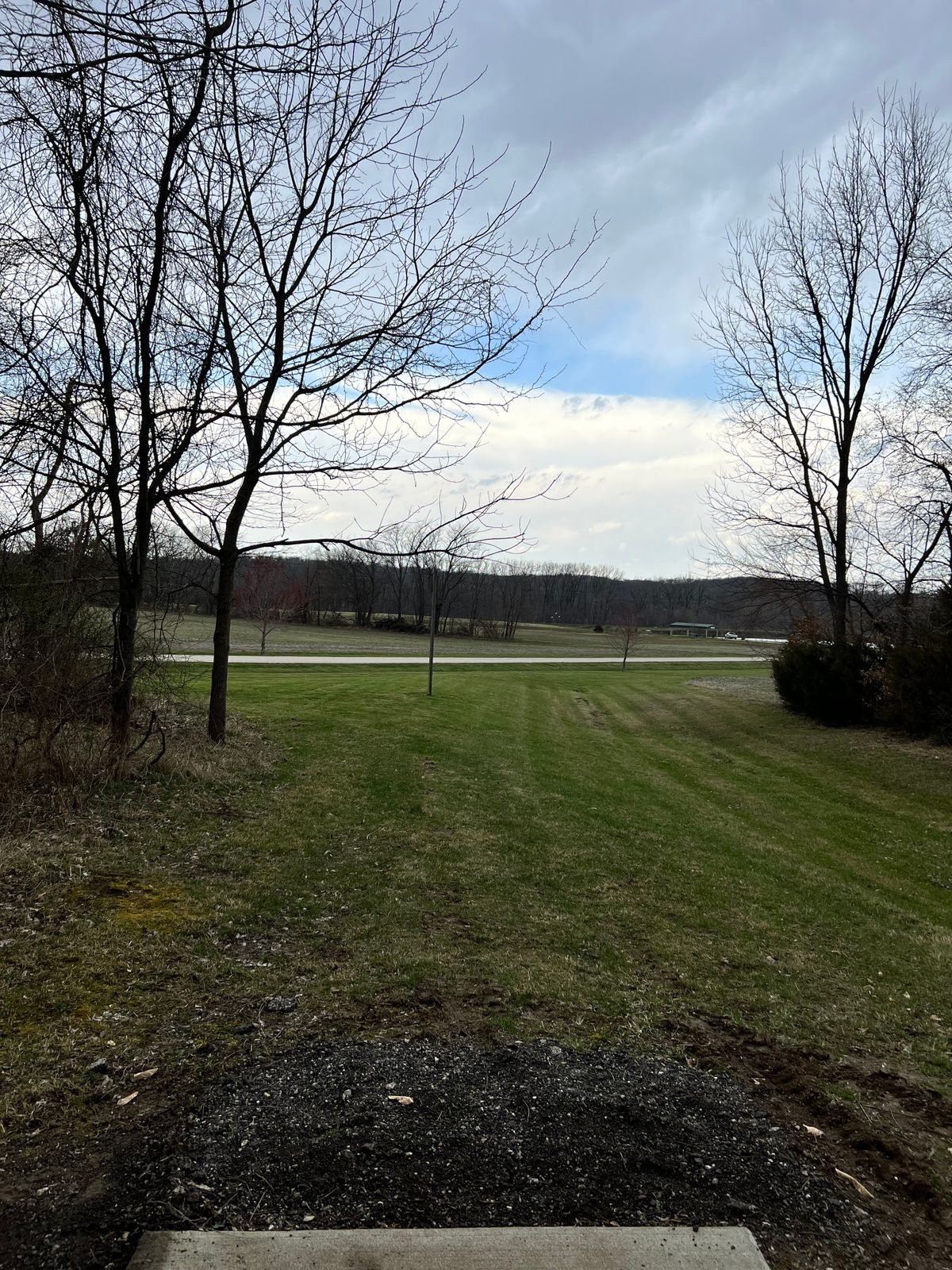 O18 tee. Fields ob, road plays as Hazard