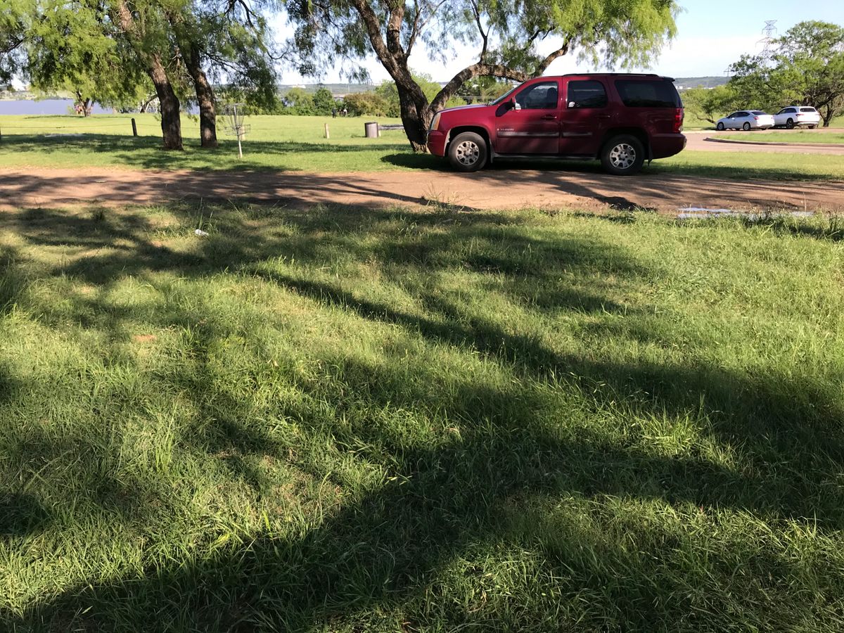 Cars everywhere near the nets on this course.