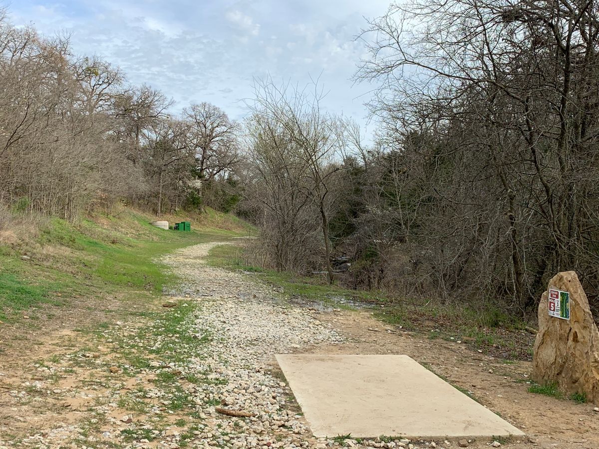 Creek on right runs length of hole, dogleg right 3-7-2020