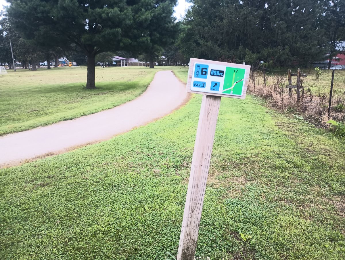 Hole six from the tee sign