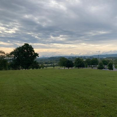 Fairway of hole 9 with mountains in the background