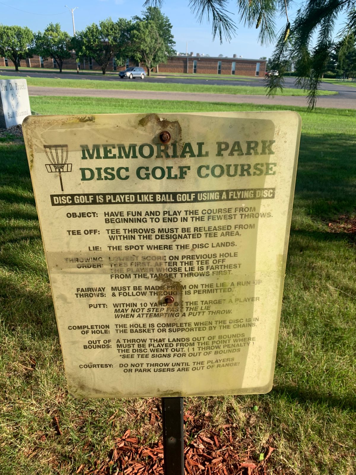 Course rules sign near tee #1