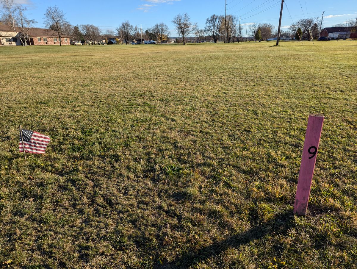 Hole 9 tee box facing basket 9