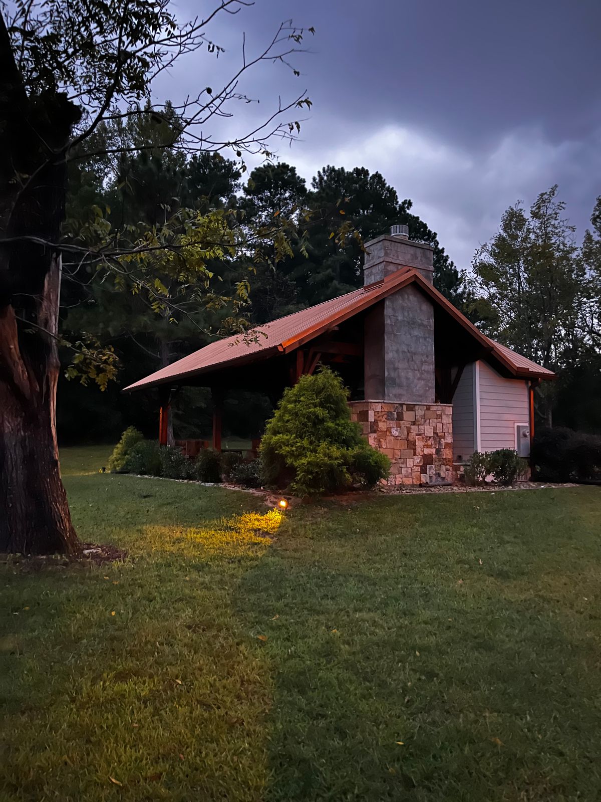 The Pavilion is located between the parking lot and Hole 1 and contains the bathroom.
