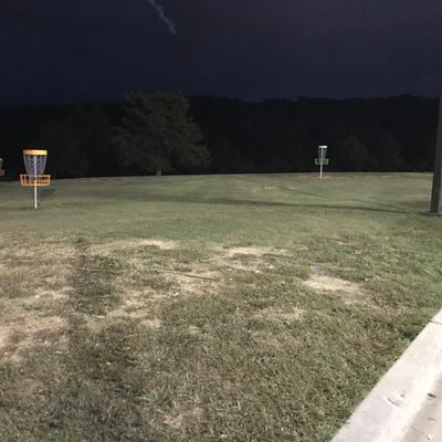 Practice basket area at night. Great spot to putt.