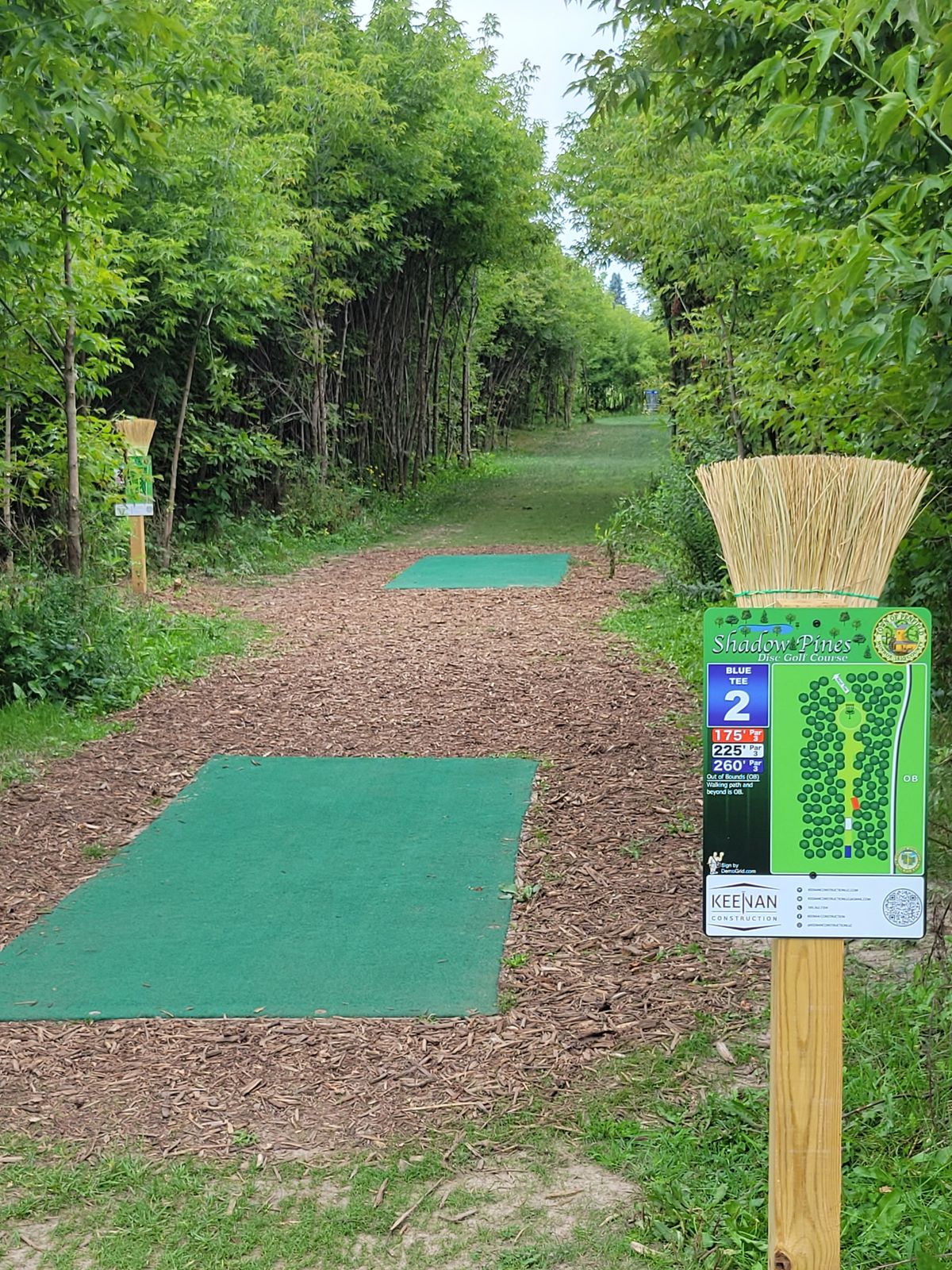 New tee signs, mulch, and brooms added. Hole #2 view from the blue tee.