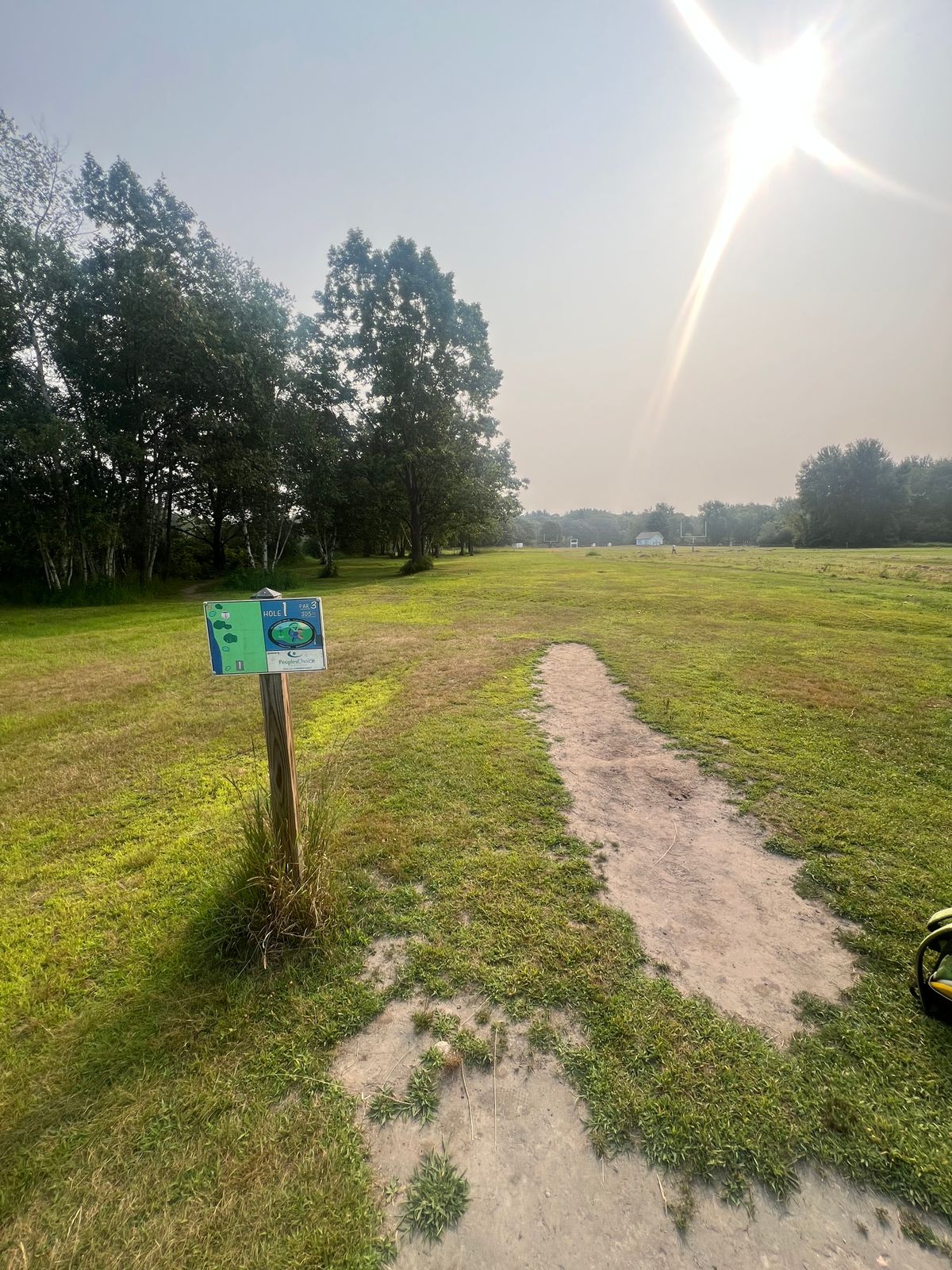Typical dirt tee and sign