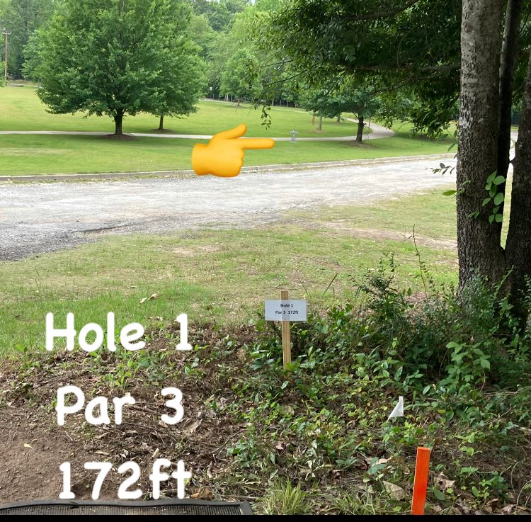 Hole #1 172ft par 3 short hole with sidewalk and driveway as OB!