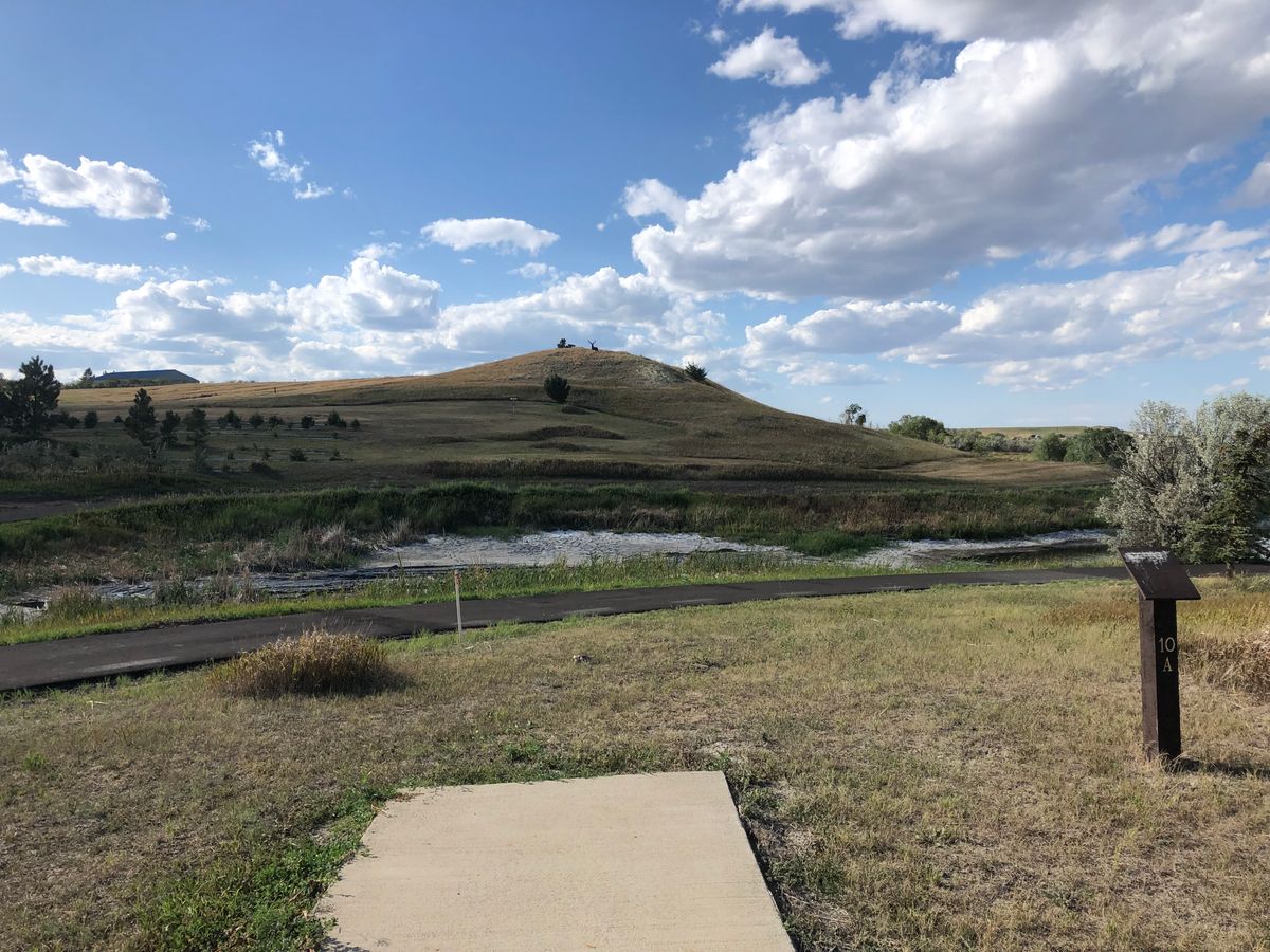 Hole 10 across a narrow water hazard and uphill