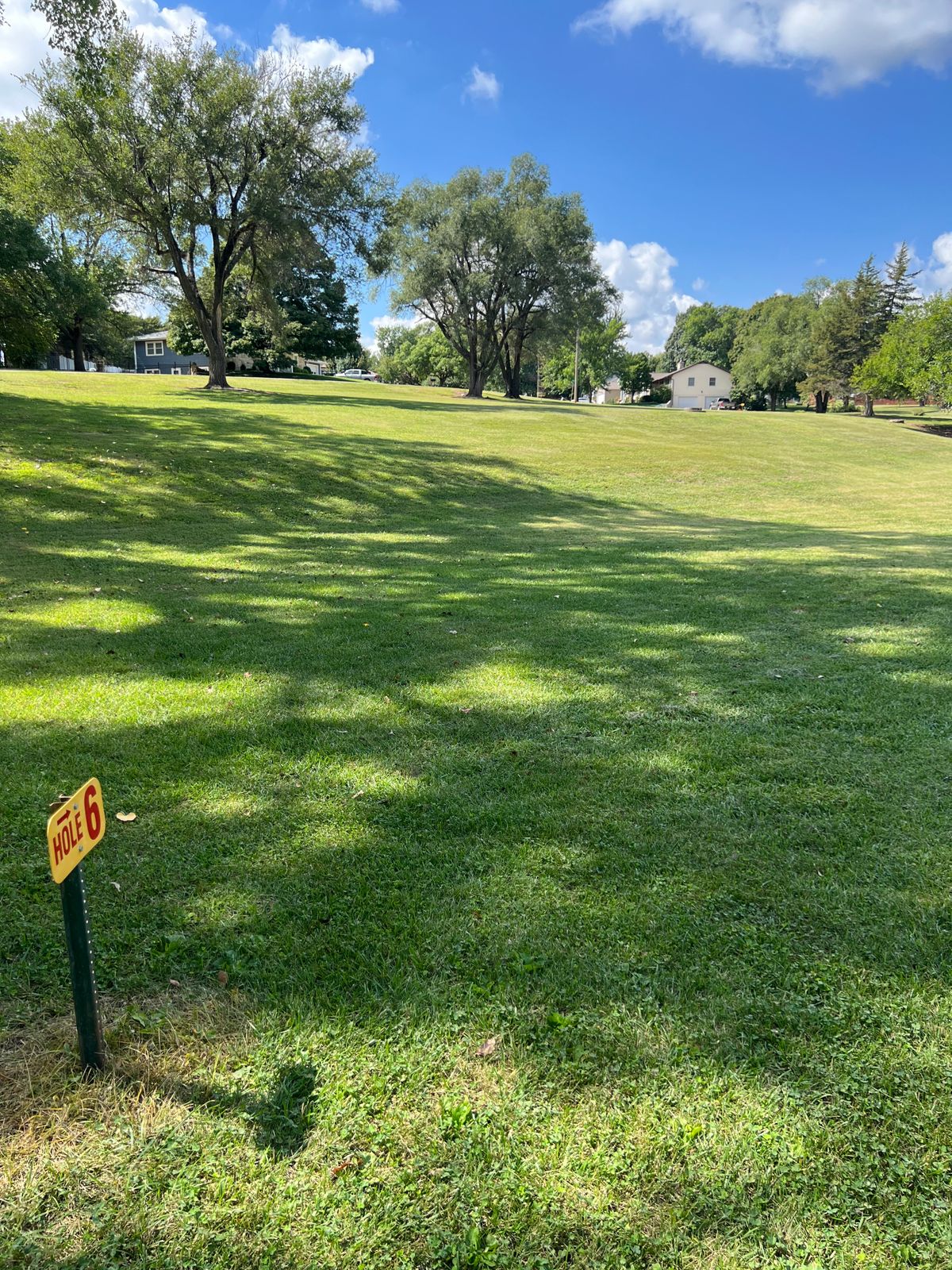 Next to double tree, slight uphill