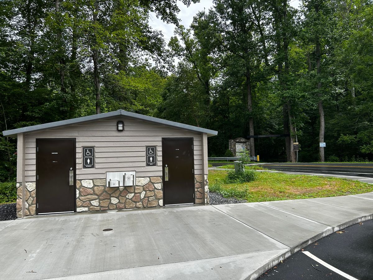 Parking lot with amenities and entrance.