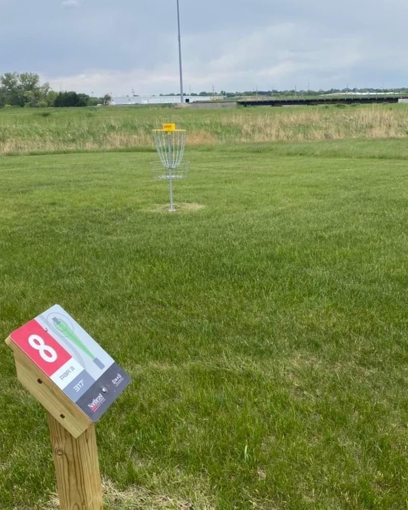 Hole 8 tee sign and hole 7 basket