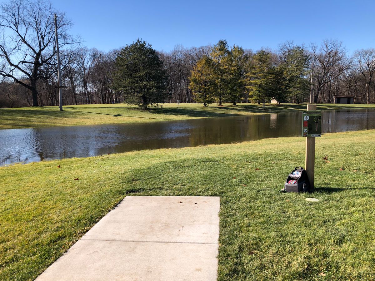 Temporary water carry hole when park purposely floods it for ice skating.