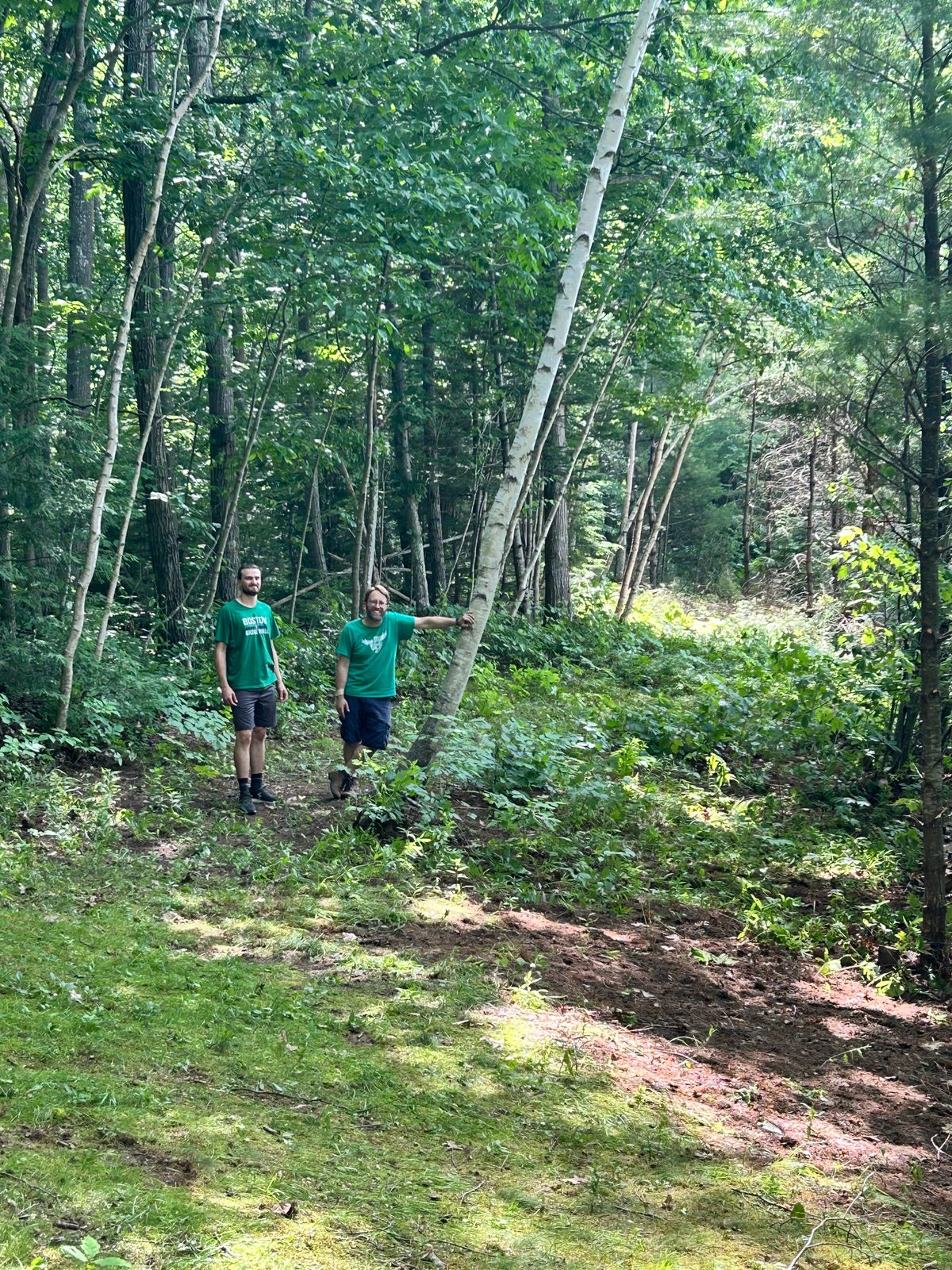 Chris and Rocco on the job as we cleaned up #9 this summer.