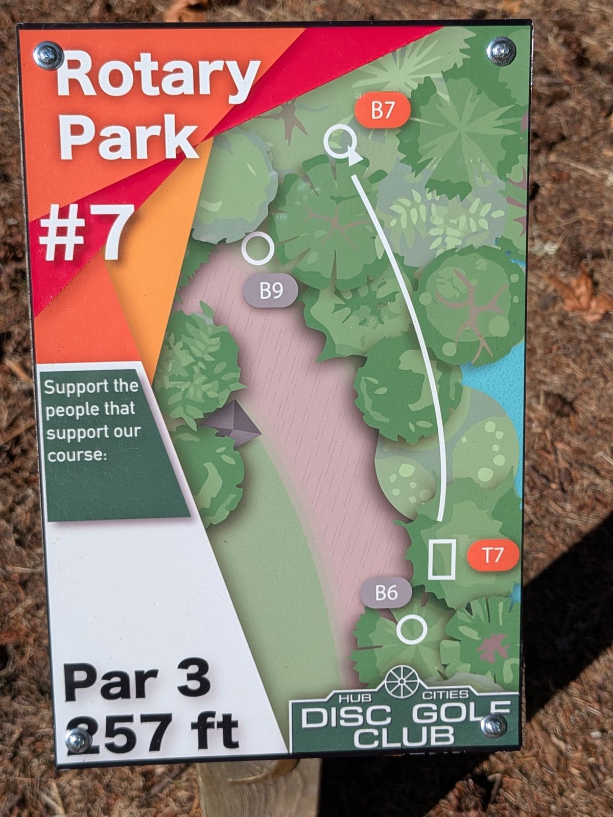 Sign for 7. Currently 25ft back of actual teebox which is a white line on the walking path.
