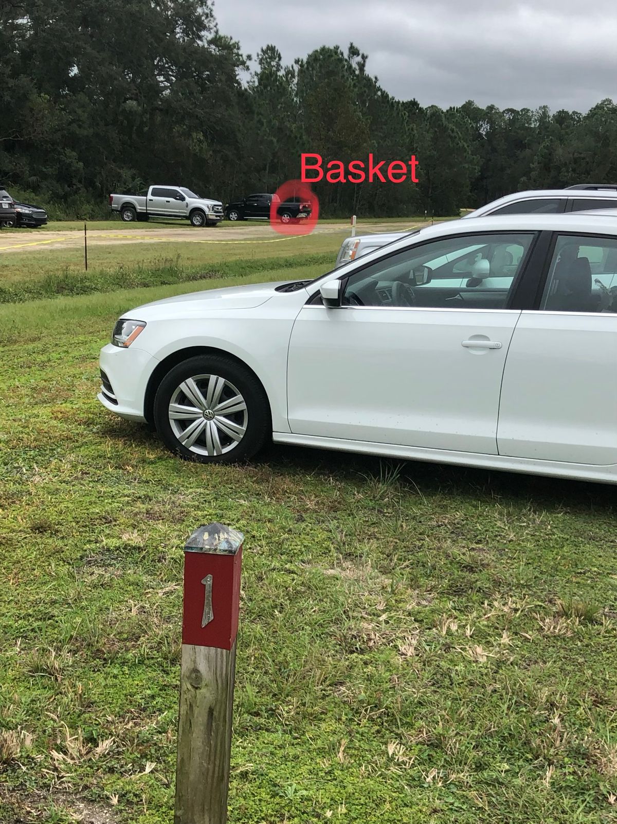 Hole one blocked by soccer parking.